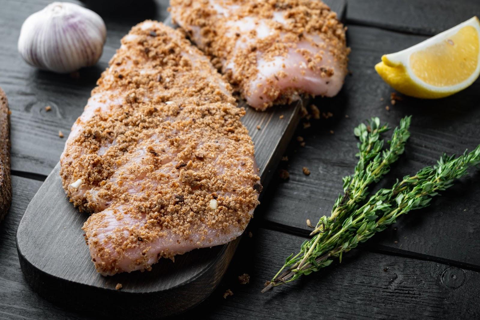 chicken cutlets coated with bread crumb mixture