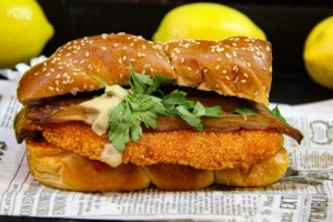 cutlet sandwich with lettuce being served