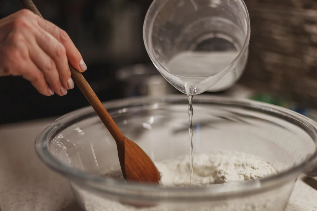 mixong water in flour