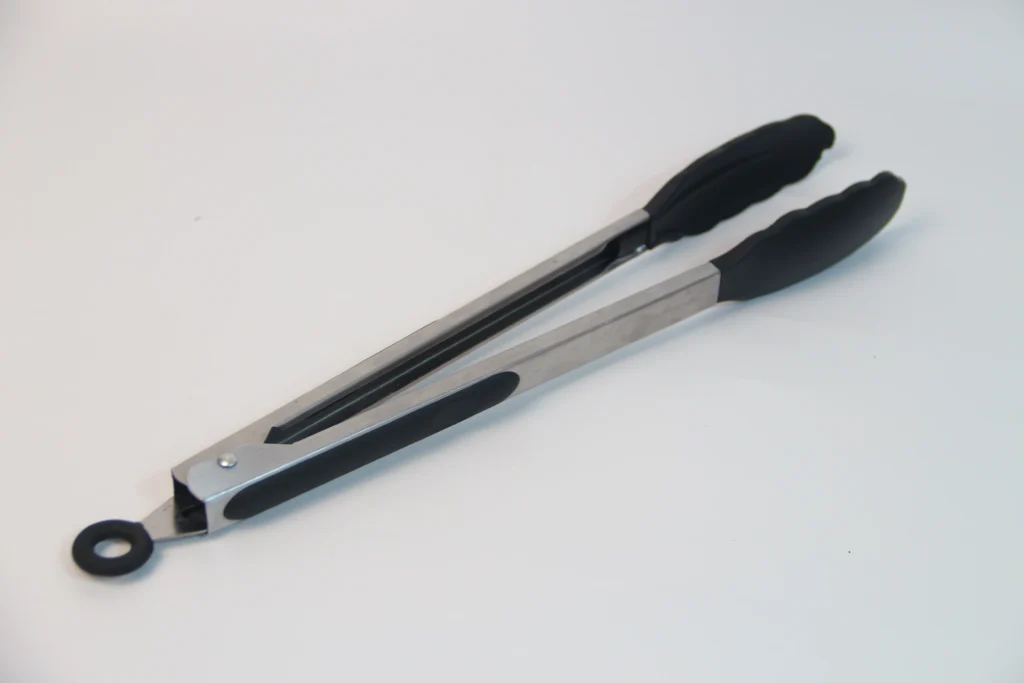 Metal tongs with silicone tips.