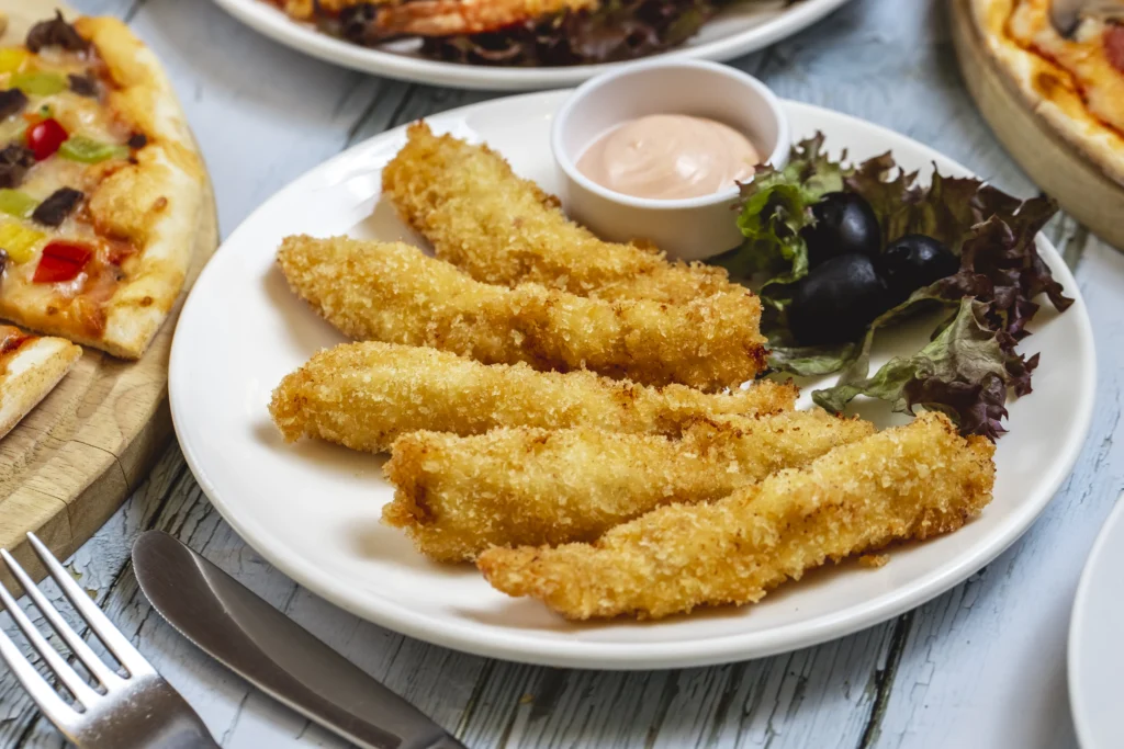 Crispy chicken fingers with dipping sauce
