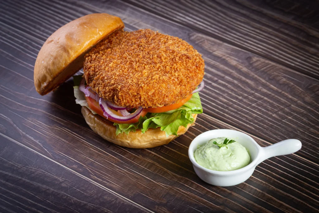 chik-fil-A cutlet sandwich served lettuce and tomatoes and sauce