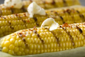 corn on the cobs with butter on top